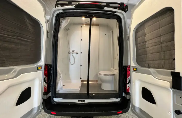 options-1 Bathroom installed into the back of the van.