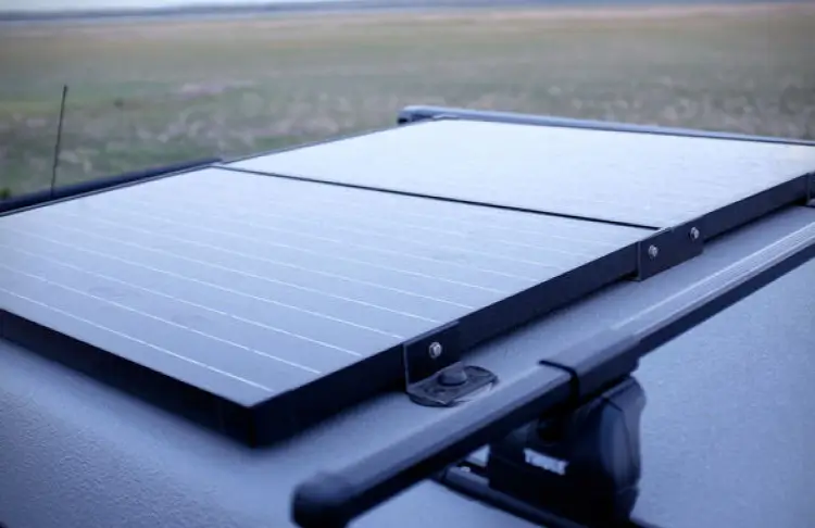 options-8 Solar panels installed on a roof of a converted van.