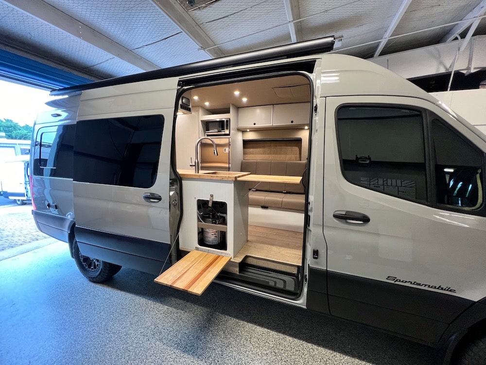 standard-conversion-equipment Interior of a grey van converted by Sportsmobile.